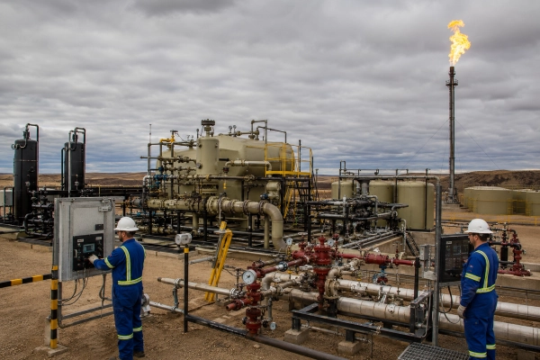 Integrated well testing equipment including a test separator and flare stack optimizing Alberta well test operations.