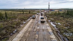 Oilfield rig mats for Alberta access roads comparing wood and composite matting